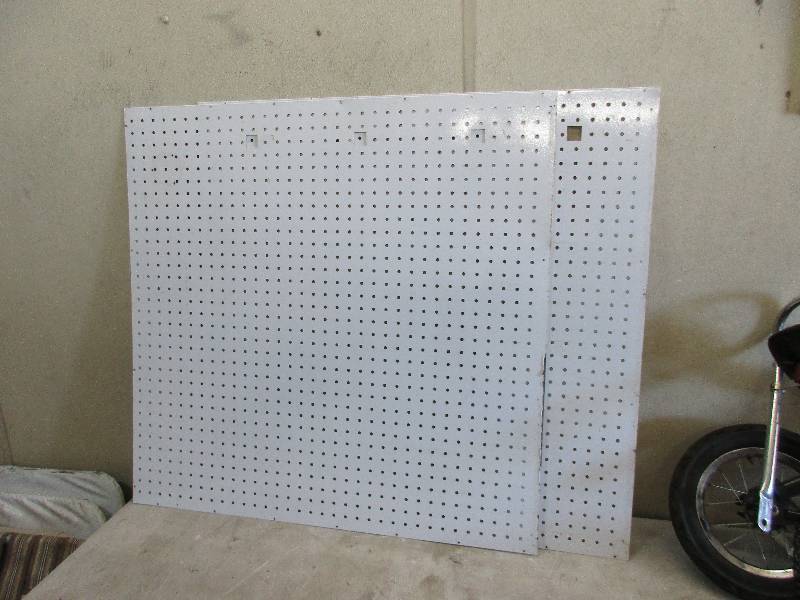 lot 57 image: 2 pieces of metal pegboard