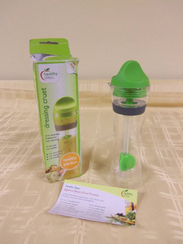 lot 31 image: Jokari Healthy Steps Portion Control Dressing Cruet
