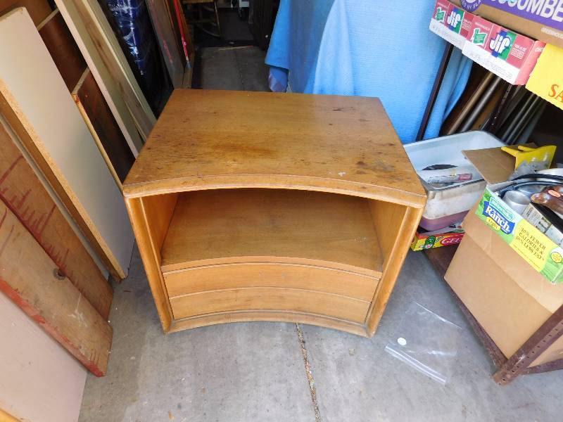 lot 4 image: solid heavy two drawer side table. This has a curved face would look great refinished