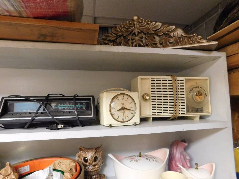lot 18 image: shelf lot radio clocks alarm clocks hole punch timex clock hole punch and more