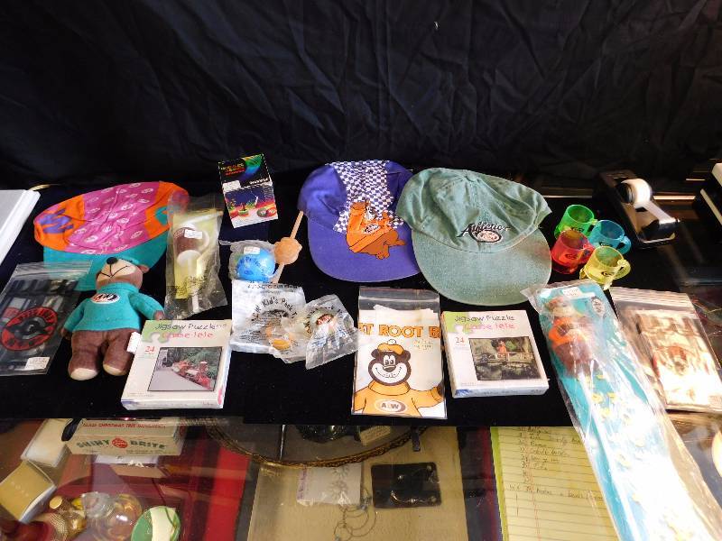 lot 55 image: many A&W collectible items