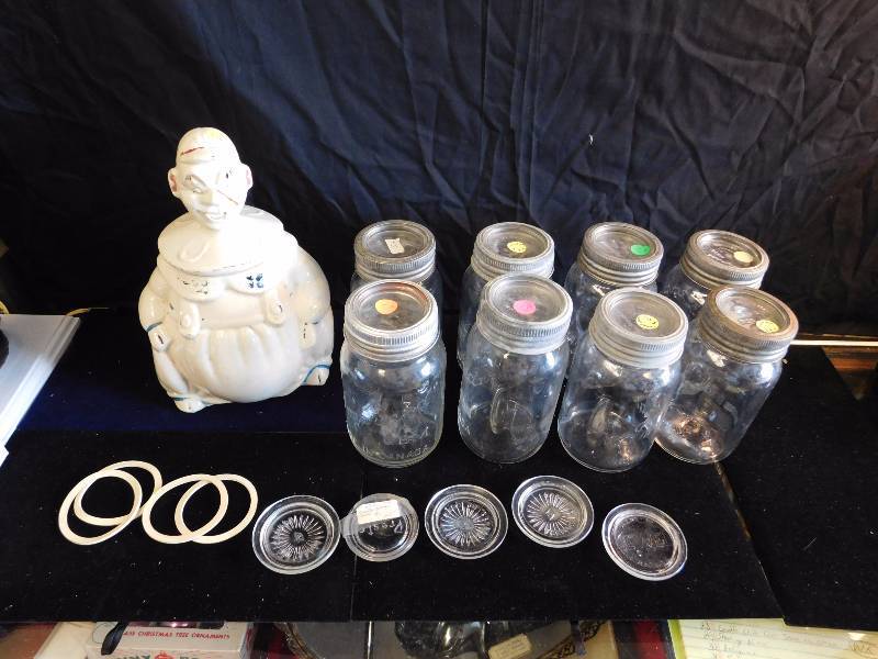 lot 57 image: vintage clown cookie jar and 8 jars and zinc lids