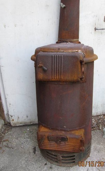 Cast Iron Wood stove, works great t...