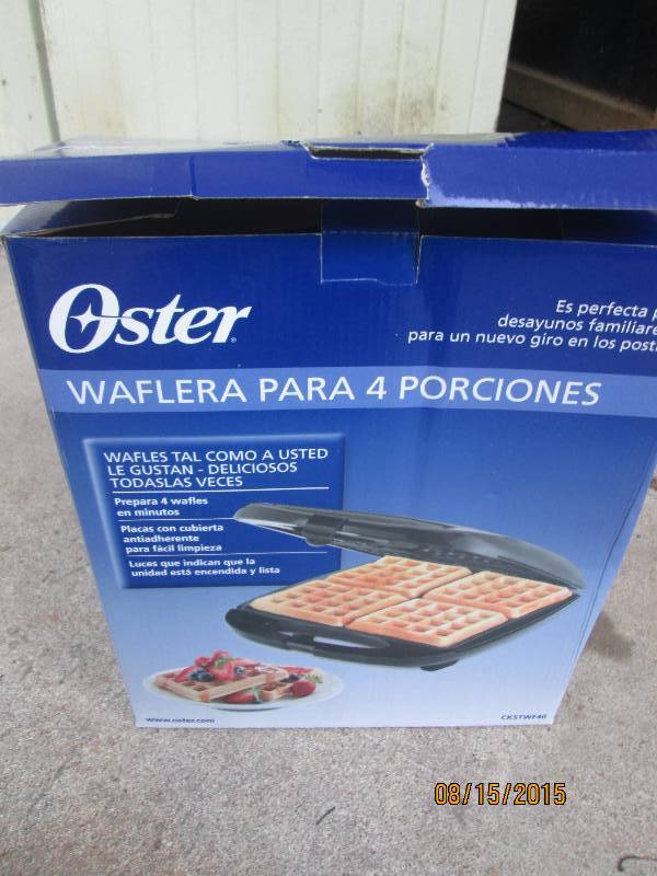 Oster 4 slice waffle maker...