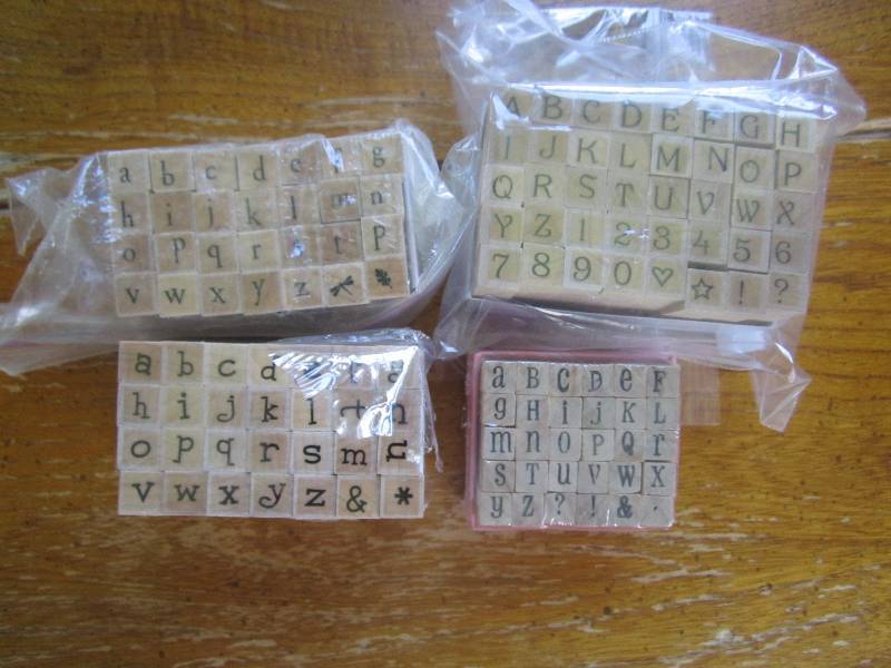 lot of 4 mini A-Z stamp sets ...
