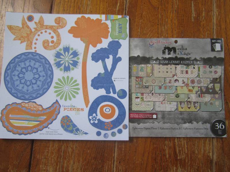 scrapbook paper and cut outs ...