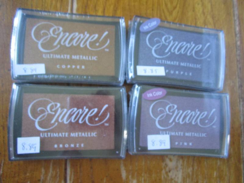 lot of 4 encore umtimate metallic i...