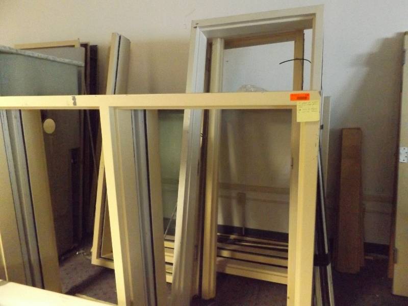 lot 128 image: 4 6 Double Window Units with Single Pane Glass, 4 32 Door Frames, 2 28 Door Frames