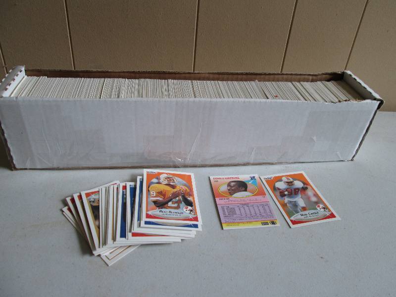 Box of 1990 Fleer Football sports c...
