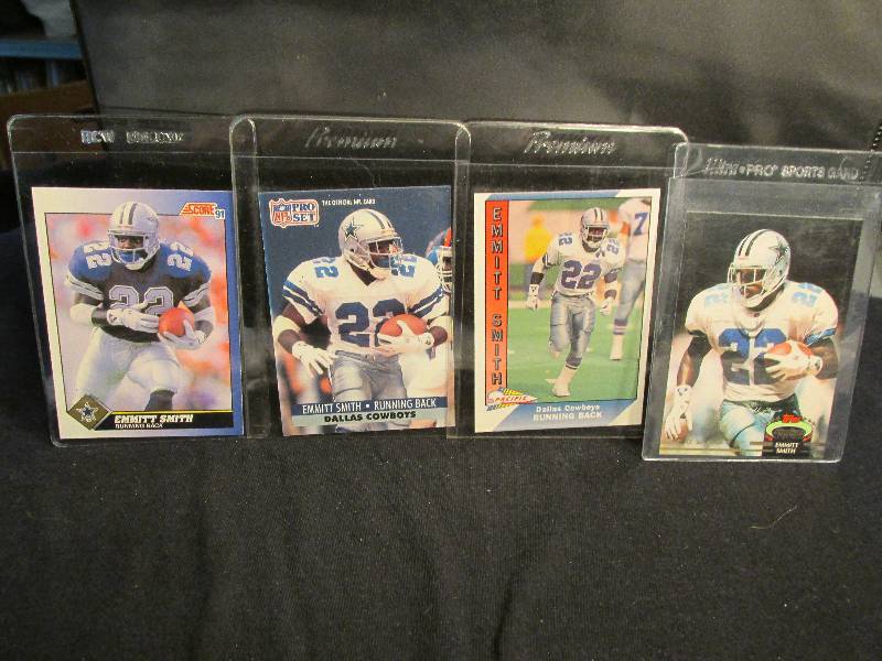 4 Emmit Smith sports cards ...