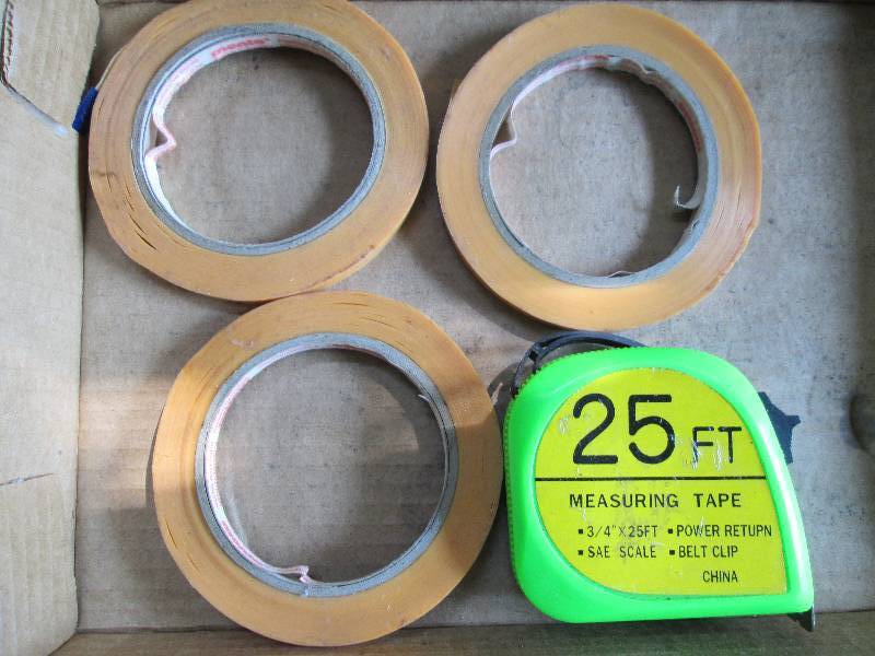 4 rolls of tape and a new 25 tape ...