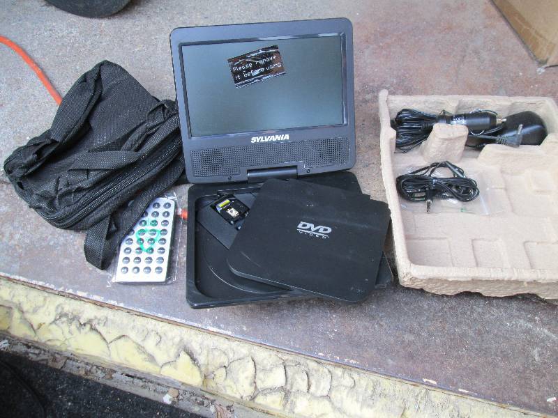 sylvania DVD video player with case...