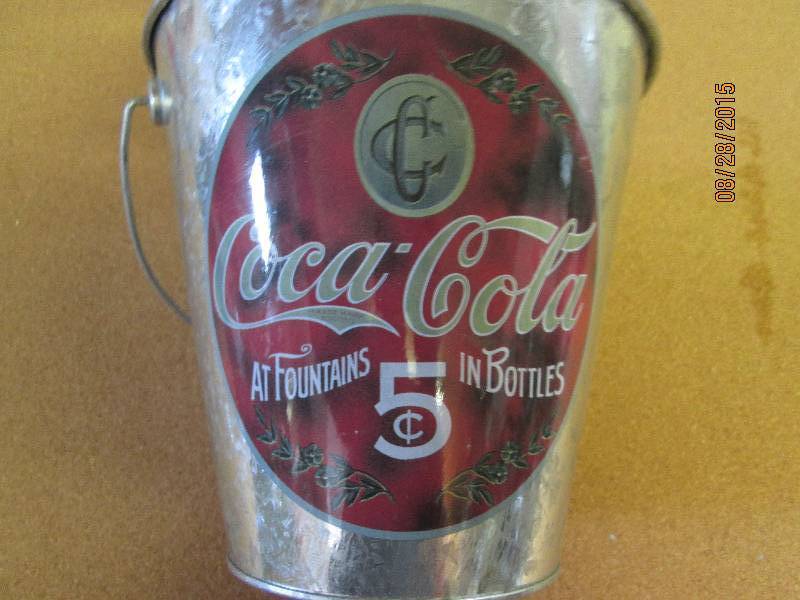 Coca Cola pail at fountains in bott...