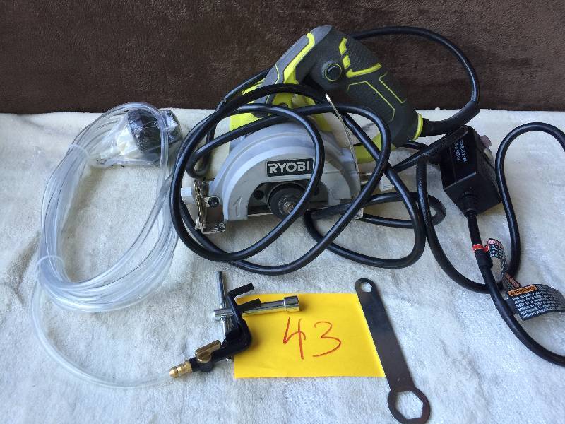 lot 43 image: 4 Hand Held Tile Wet Saw