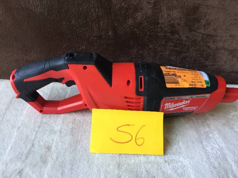 lot 56 image: Milwaukee Handheld Vacuum- tool only no attachments