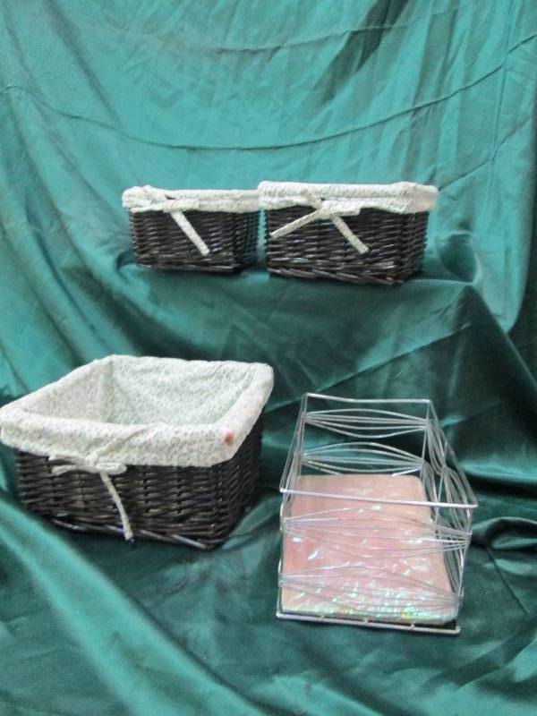 lot 1 image: Wicker basket with cloth in and aro...