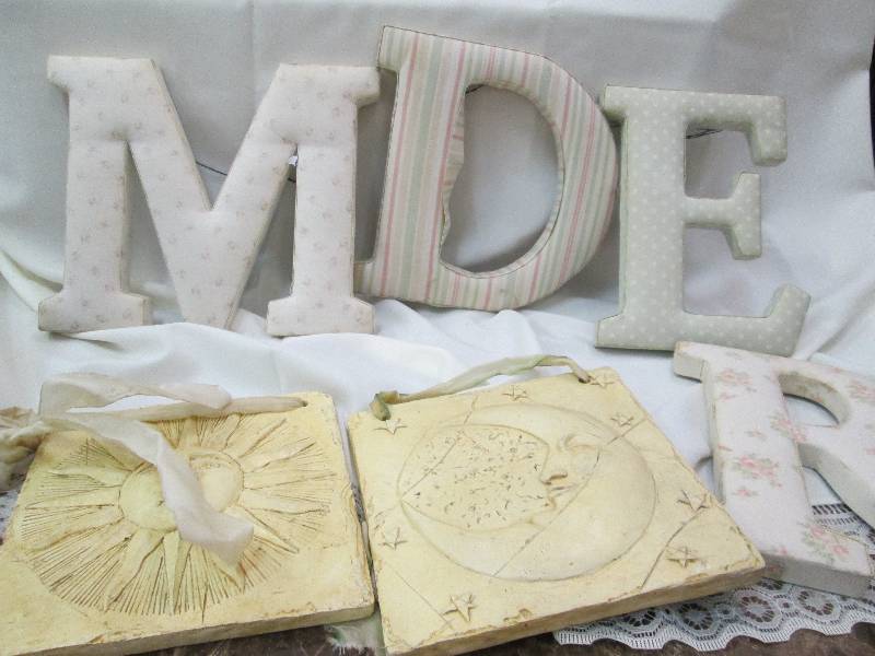 lot 76 image: Wooden letter MDER and  moon and su...