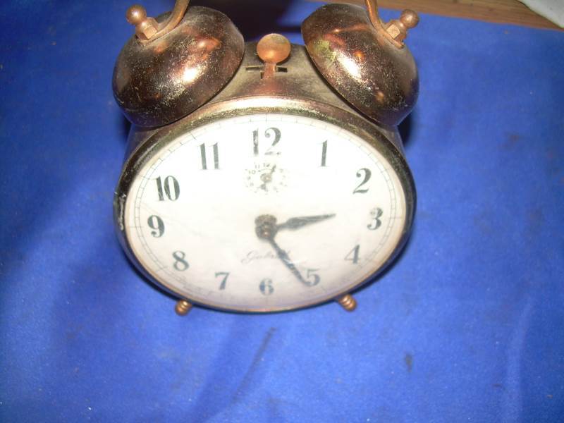 vintage brass alarm clock