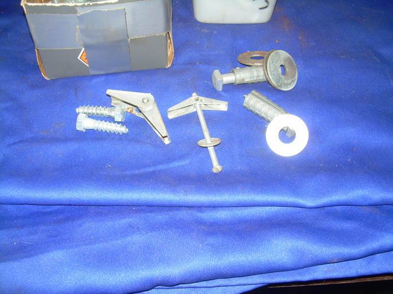 2 container of bolts and washers