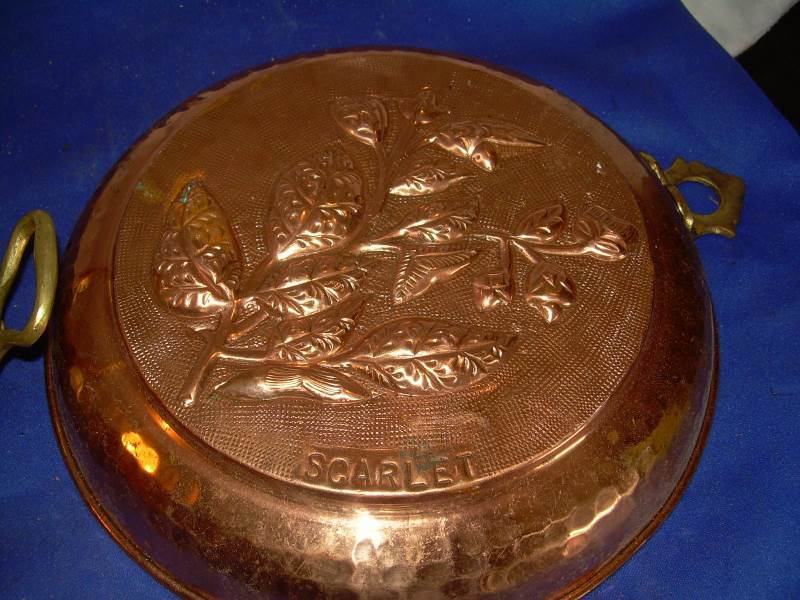 copper pot and wall hanging