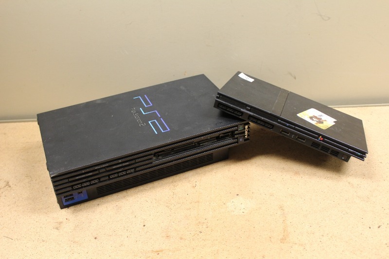 lot 57 image: Pair of PS2s, No Cords, untested