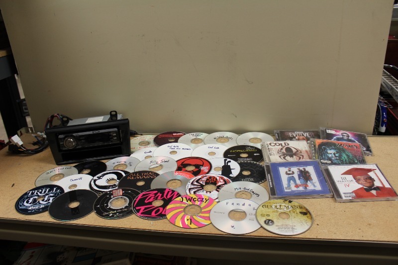 lot 73 image: Eclipse Car CD Player with CDs