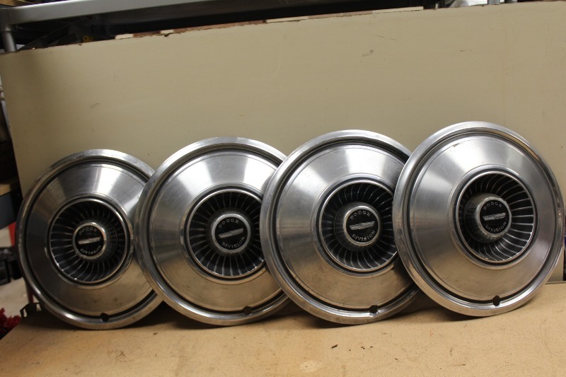 lot 79 image: Dodge Hubcaps