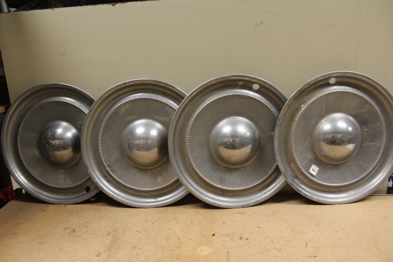 lot 84 image: Vintage Hubcaps