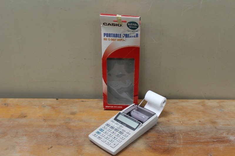 lot 142 image: CASIO Portable Printing Calculator