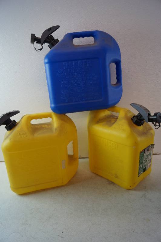 lot 14 image: Plasitc Fuel Cans