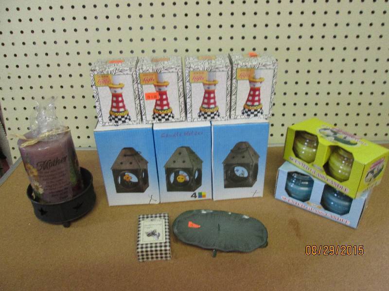 mixed lot of candles, candle holder...