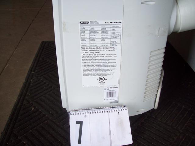 lot 7 image: DeLonghi Pinguino 14,000 BTU Portable 4-in-1 Air Conditioner With Heat Pump Technology with Accessories Tested Works
