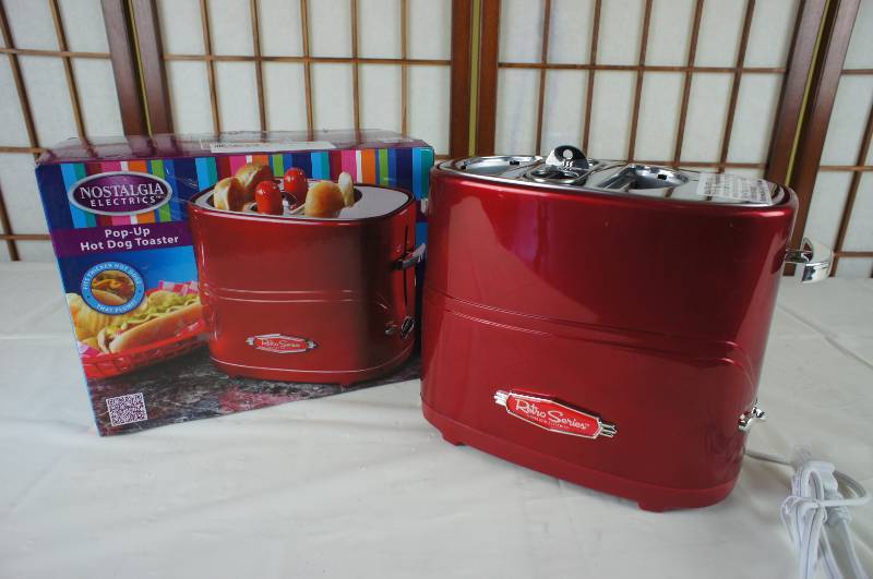 lot 79 image: Nostalgia Electrics Hot Dog Hotdog Pop-up Toaster Cooker Machine
