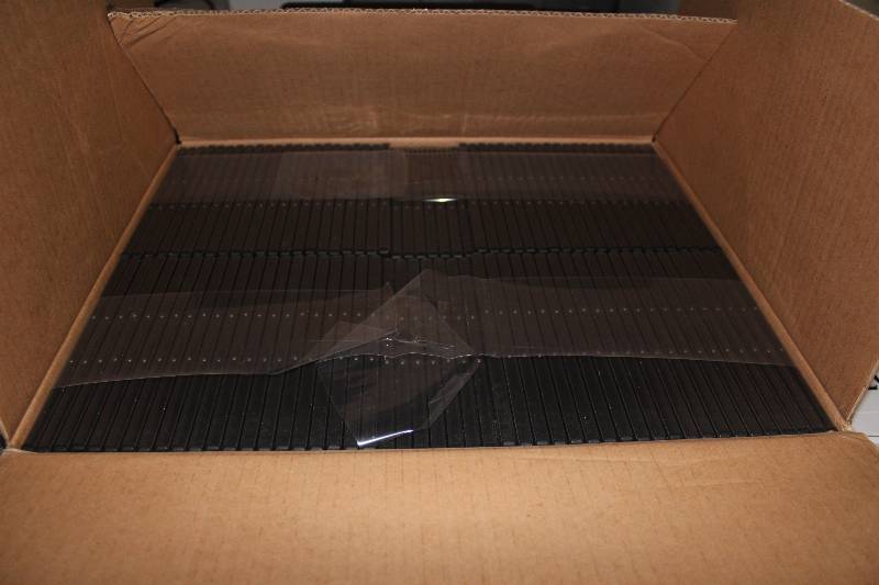 lot 23 image: Box Lot of US Digital Media DVD Cases Thin Double Black app. 100 ct.
