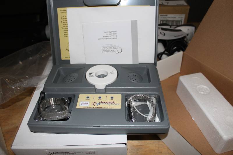 lot 21 image: Pacetrak Pacemaker Transmitter & Enr wHard Case Model Pacetrak Speaks.