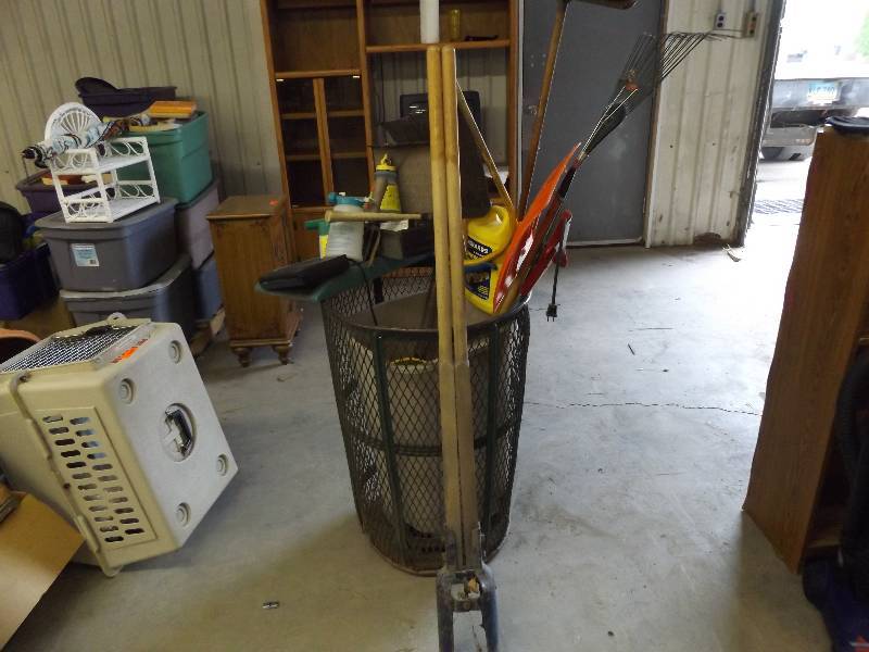 lot 115 image: Rolling Garbage Can, Water Flow Director, Rakes, Shovel, Post Hole Digger, Cord, more
