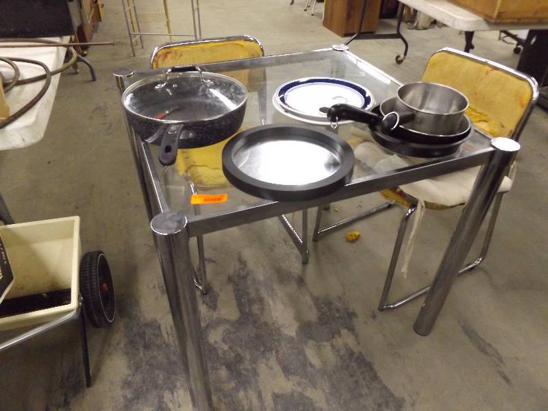 lot 161 image: Glass Top Table, 2 Chairs (need to be redone), Cooking Pans