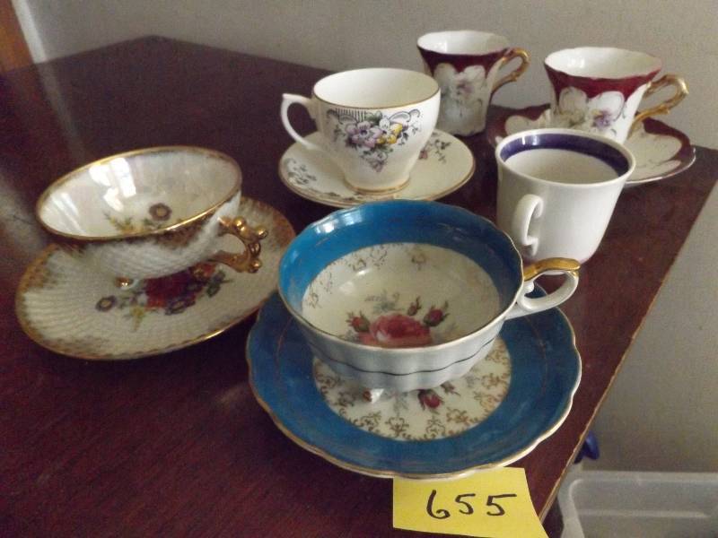 4 sets of cups and saucers