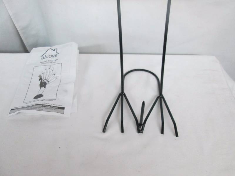 lot 70 image: alcove Solar Peacock Garden Figure