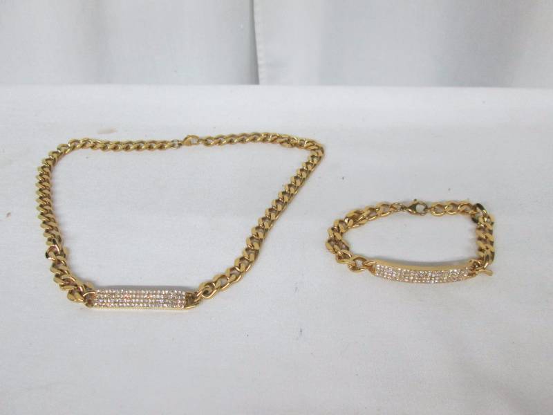 lot 96 image: Goldtone Steel Crystal ID Curb Necklace & Bracelet