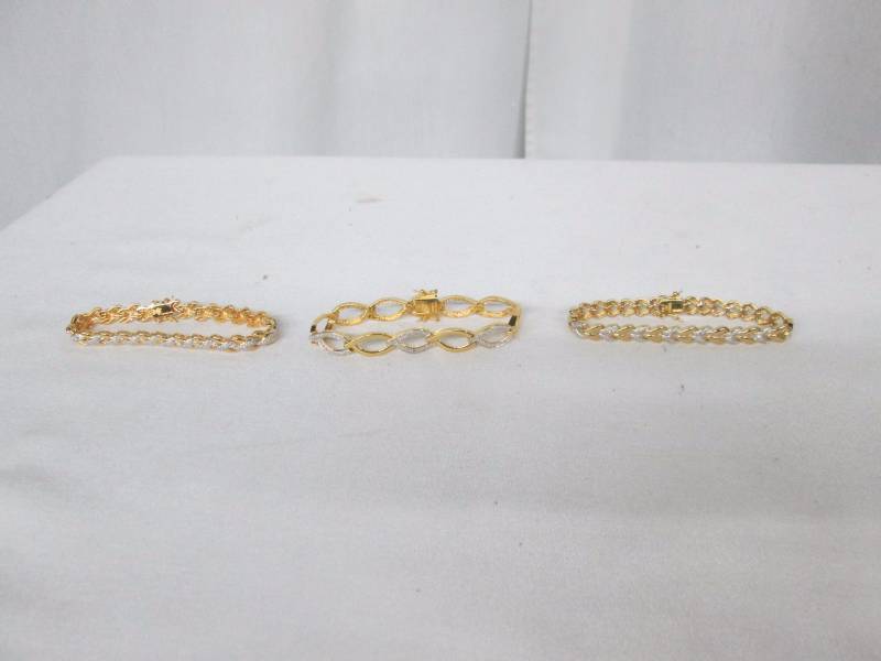 lot 92 image: Goldtone 3-Pc. Bracelet Set