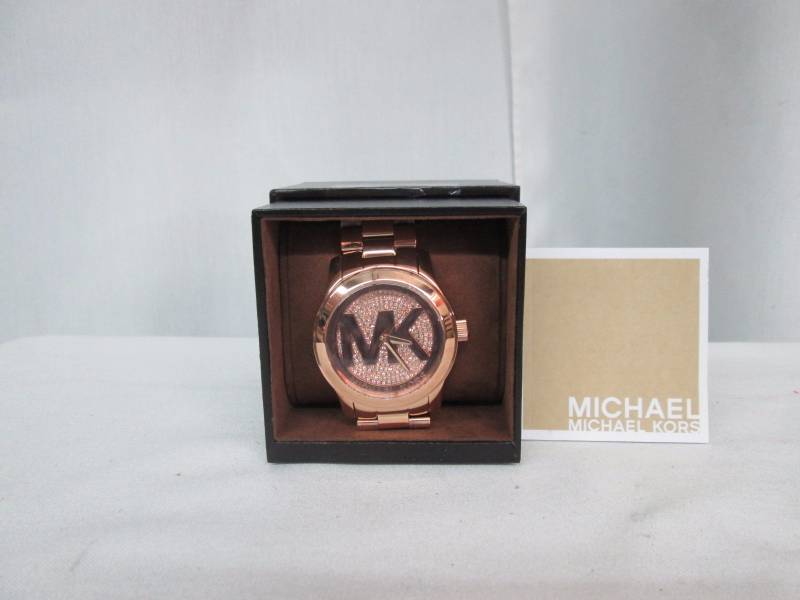 lot 5 image: Michael Kors Womens Runway Gold Watch