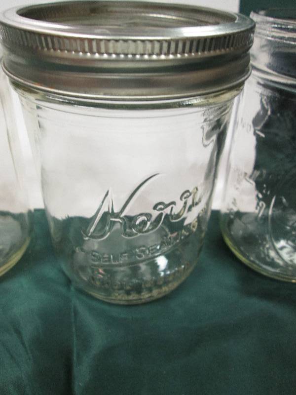 4 Kerr Glass Sealable Jars...