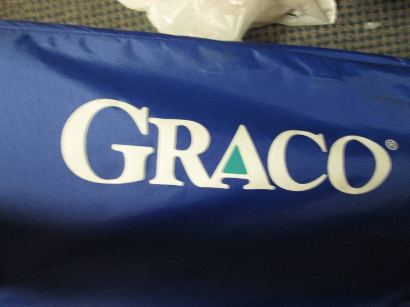 Graco folding crib...