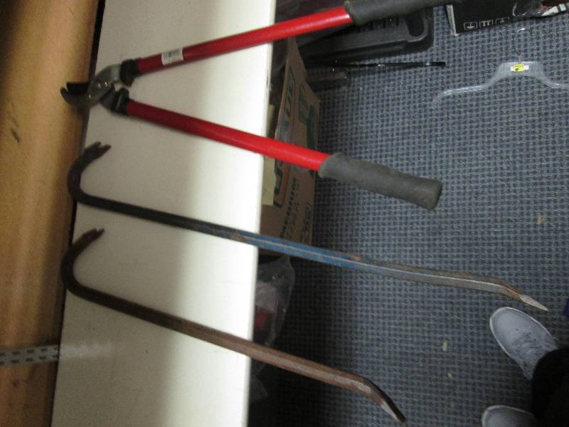 Bolt cutter and pry bars...