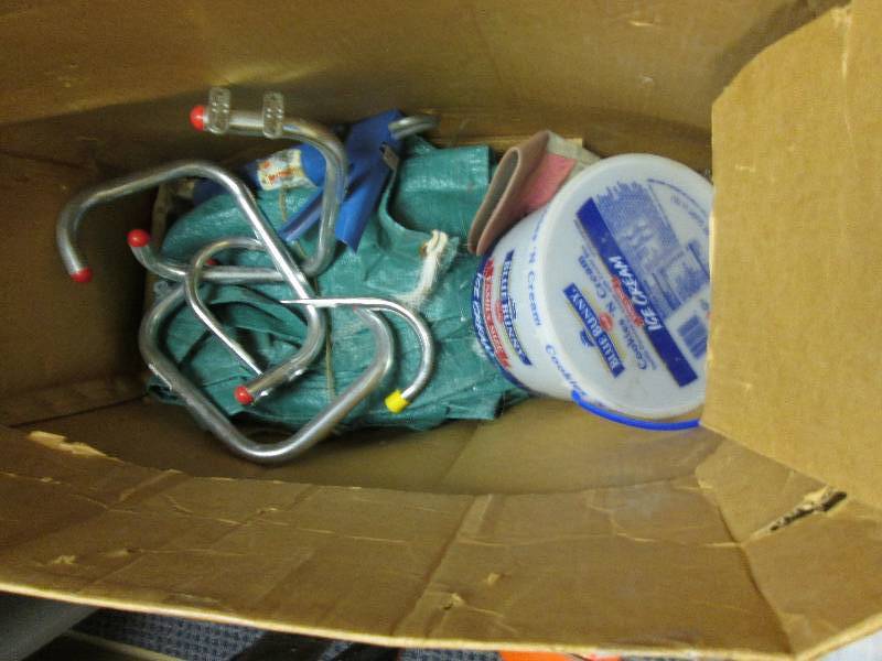 Biucket of nails and other tools an...