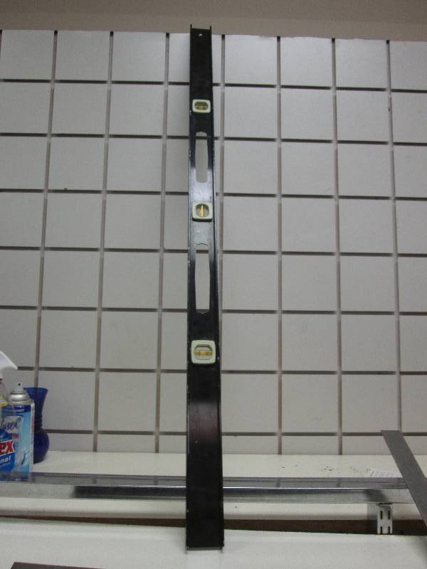 Long Level, square, garden fork...