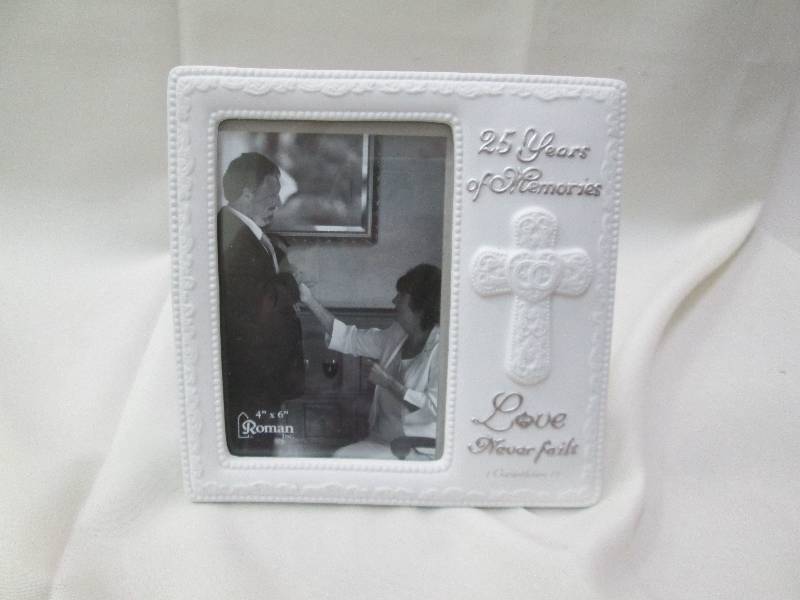 Picture frame and says 25 years of ...