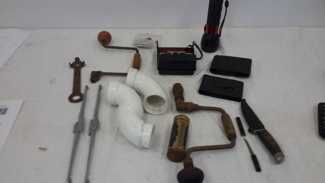 knives, flashlight, old tools, camera, pvc