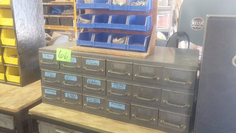 lot 66 image: 18 Bin metal storage cabinet and contents.  12 bin plastic cabinet